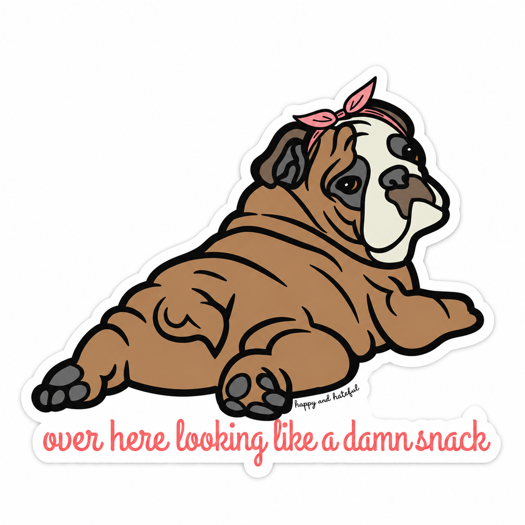 A die-cut sticker featuring a cartoon bulldog lying down with a pink bow/bandana, above the phrase 'over here looking like a damn snack' in script. The sticker is shown on a plain white background.