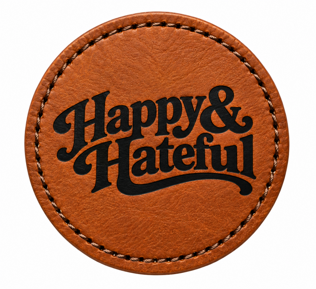 A round leather patch with stitched edges and the words 'Happy & Hateful' printed in black script, shown on a plain white background.