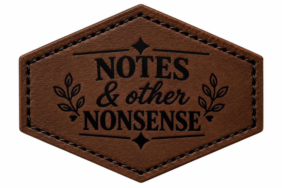 A hexagonal brown patch with black stitched borders and the engraved text 'NOTES & other NONSENSE' with decorative leaf motifs, shown on a plain white background.