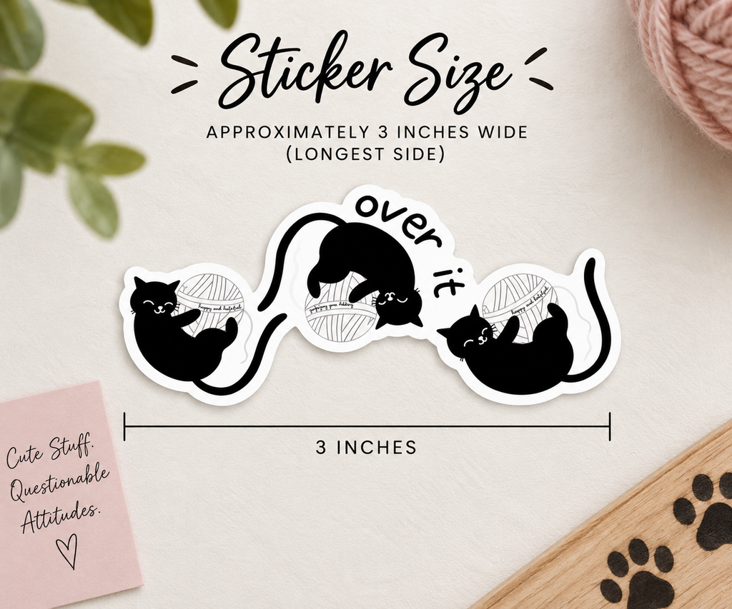 A die-cut vinyl sticker featuring black cartoon cats playing with yarn and the text 'over it'. Sticker size is shown as 3 inches long. 