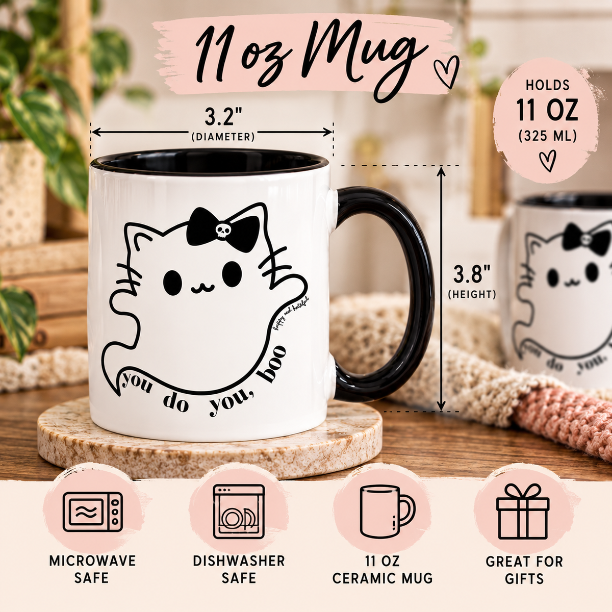 A white ceramic 11 oz mug with a black handle and black interior, featuring a ghost graphic with a bow tie and the text 'you do you, boo'. The image includes dimension markers showing 3.2 X 3.8.